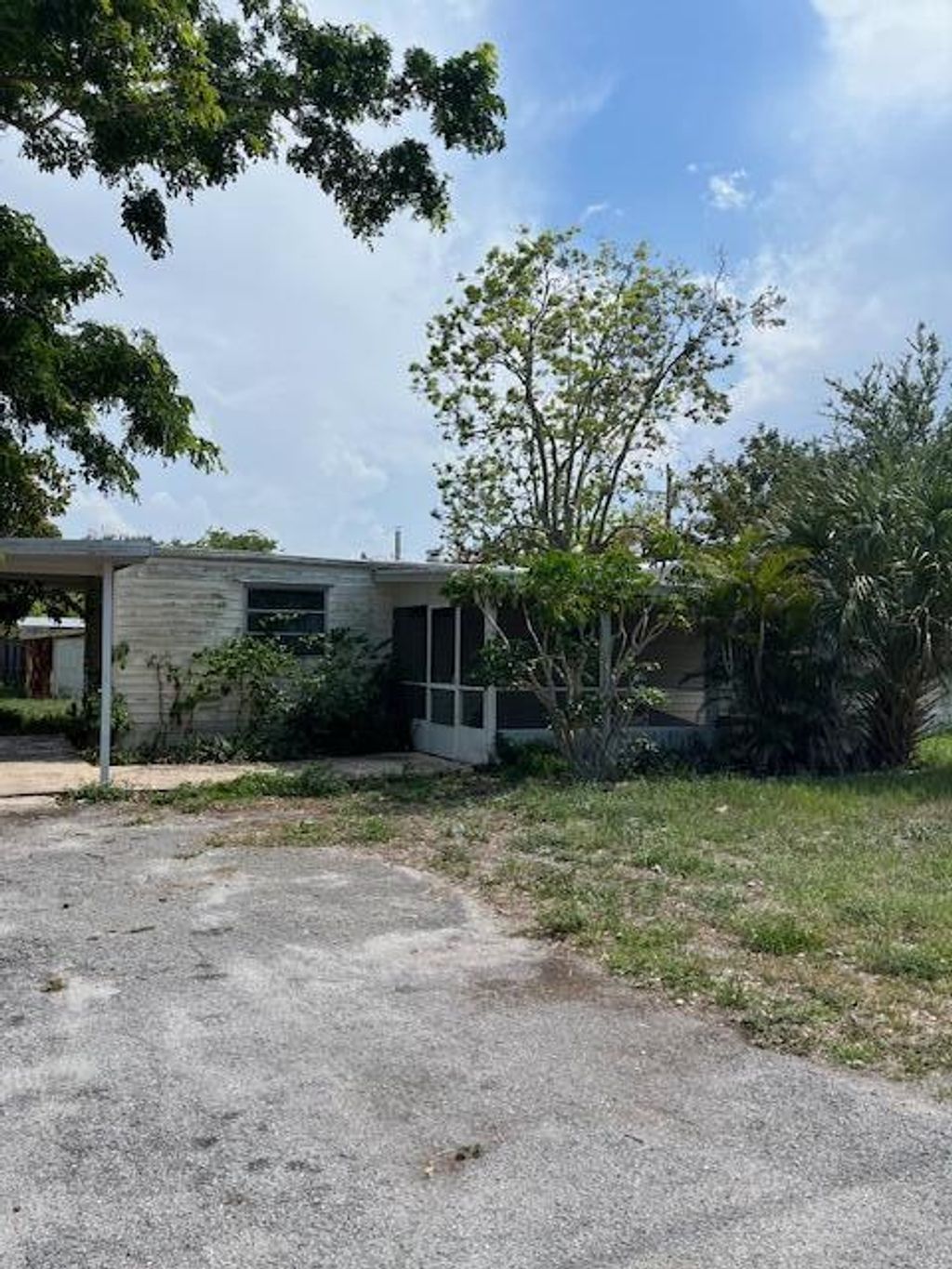 Photo of 1260 NE Olive Street, Jensen Beach, FL 34957 (MLS # R10991593)