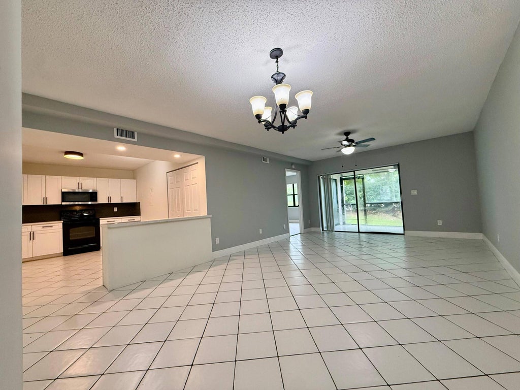 Photo of 9633 Riverside Drive #E2, Coral Springs, FL 33071 (MLS # B26045170)