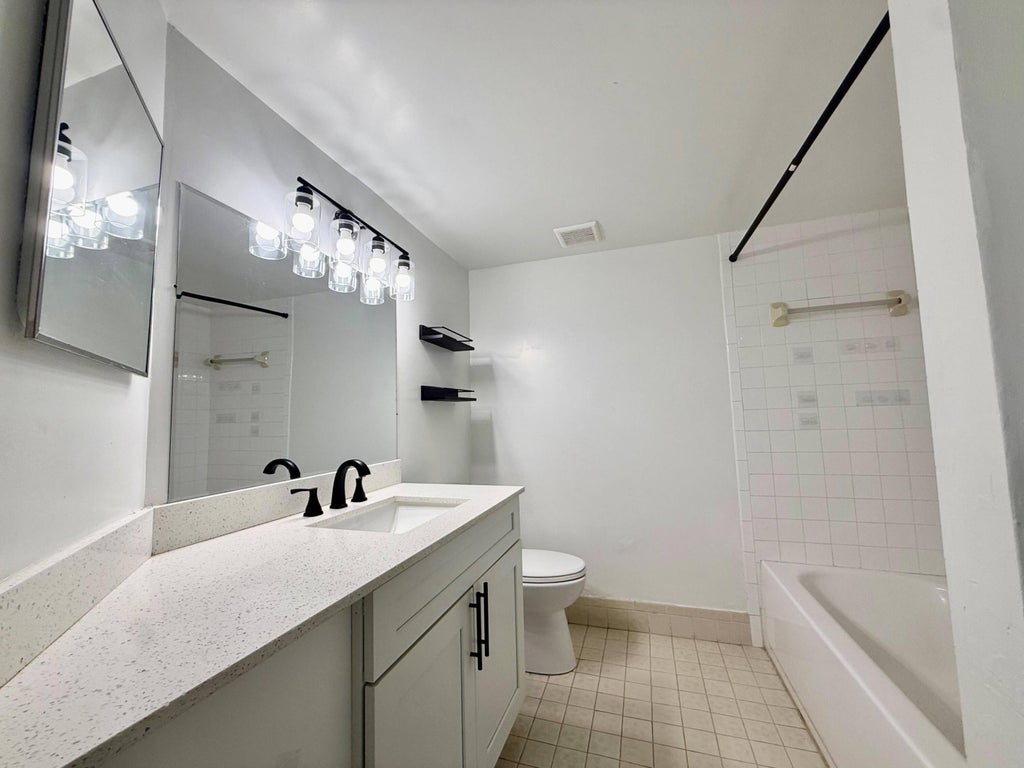 Photo of 9633 Riverside Drive #E2, Coral Springs, FL 33071 (MLS # B26045170)