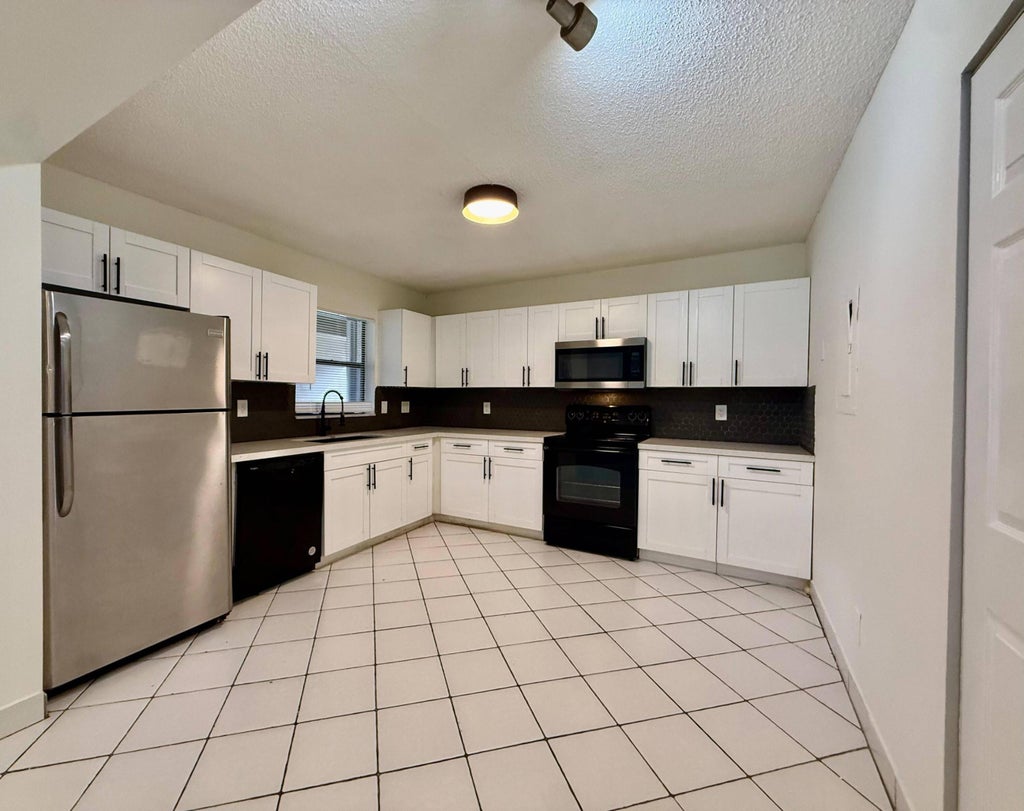 Photo of 9633 Riverside Drive #E2, Coral Springs, FL 33071 (MLS # B26045170)