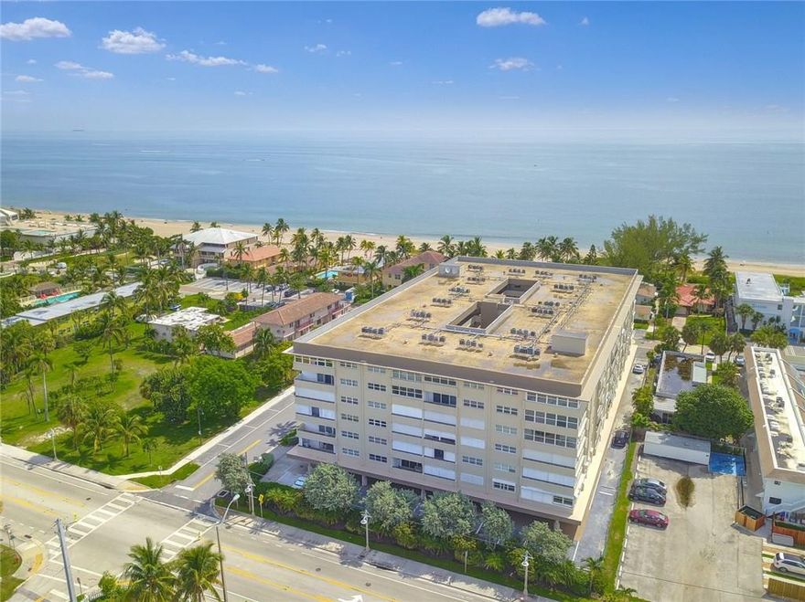 AMAZINGLY LOW PRICE!  BEST BUY AT THE BEACH FOR A 2/2! Own a piece of Paradise!  Pompano was named "Best Beach" by Money Magazine.  Christopher House is a few short blocks from revitalized Atlantic Blvd. and fishing pier. Gorgeous club house and pool on the sand with private beach access.  Boutique atrium styled building remodeled and assessment paid. Open balcony faces south with ocean view.  Unit needs updating. Wonderful opportunity to make this bright, spacious condo your own.  Washer/dryer in the unit.  Deeded covered parking space. MOTIVATED SELLER !  WON'T LAST AT THIS PRICE.