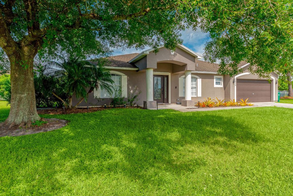 Photo of 5856 NW Fogel Court, Port Saint Lucie, FL 34986 (MLS # R10915764)