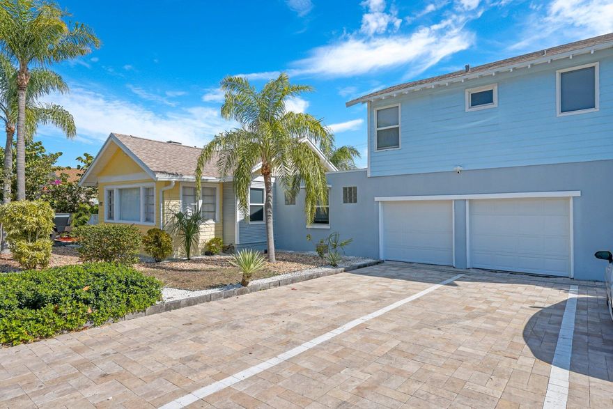 This prime investment opportunity offers a turnkey triplex situated on a spacious double lot. All three units are updated and beautifully designed and furnished with in unit washer and dryers. Nestled in the heart of highly desirable Lake Worth Beach, this exceptional triplex offers an unbeatable location mere minutes from the sparkling Atlantic shoreline and the serene Intracoastal Waterway. Residents and tenants enjoy effortless access to pristine beaches, the vibrant downtown scene filled with restaurants, coffee shops, and entertainment, making this a true coastal lifestyle with outstanding income potential.
The residence comprises of three beautifully maintained units: two generous two-bedroom, two-bathroom residences and one comfortable one-bedroom, one-bathroom unit. Situated on a 13,500sf lot, this property offers an expansive outdoor space and the opportunity to add a private pool or other exterior amenities such as a putting green. With a two-car garage and four additional dedicated parking spaces, this is a rare find. Recent improvements include a BRAND-NEW ROOF.  Offered turnkey and move-in ready, the triplex is perfectly positioned for immediate occupancy, traditional long-term rentals, or even short-term vacation use, delivering strong cash flow in one of Palm Beach County's most sought-after coastal markets. Whether you're an investor searching for reliable rental income, a live-in owner looking to offset expenses with tenant revenue, or simply someone who appreciates beachside living with income potential, this rare triplex checks every box. Don't miss the chance to own a fully updated, turnkey multi-family gem in Lake Worth Beach's premier location.