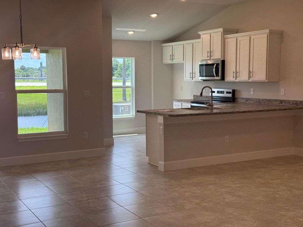 Photo of 5117 Modeno Street, Fort Pierce, FL 34951 (MLS # R11101524)