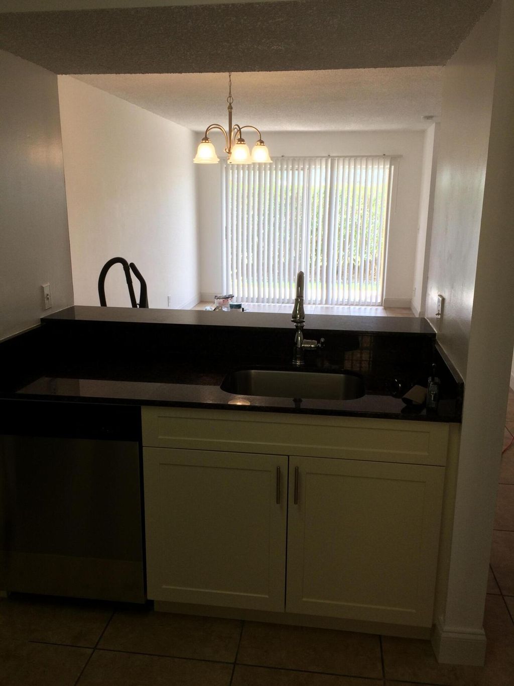 Photo of 1020 Lake Shore Drive #103, Lake Park, FL 33403 (MLS # R10934800)