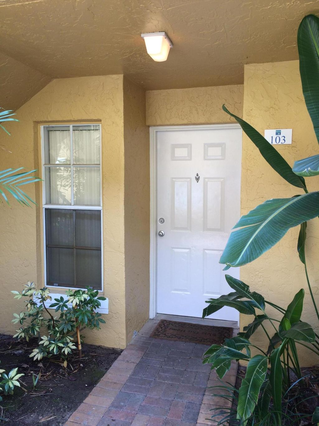 Photo of 1020 Lake Shore Drive #103, Lake Park, FL 33403 (MLS # R10934800)