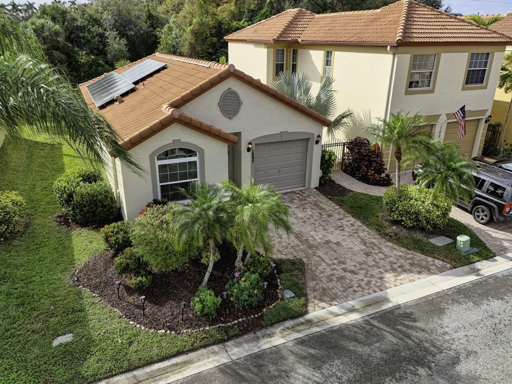 Photo of 1095 Via Jardin, Riviera Beach, FL 33418 (MLS # R11155519)