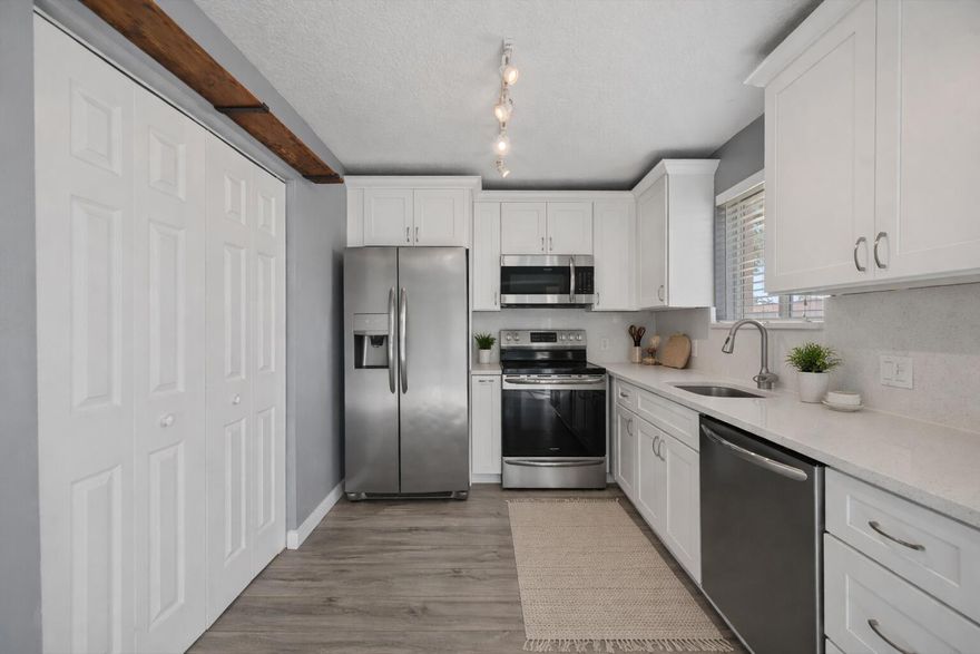 Welcome to 3486 Briar Bay Blvd, unit 101, a beautifully maintained 3-bedroom, 2-bath residence located in a gated community in the heart of West Palm Beach.The heart of the home is the stunning remodeled kitchen, perfectly positioned to capture peaceful water views from both the kitchen window and dining room sliders. Sunrise views over the water create a serene start to the day and the perfect setting to enjoy your favorite beverage.Bright, cheerful paint colors flow throughout the home, creating a warm and inviting atmosphere. To help buyers envision the full potential, virtual staging and neutral paint renderings have been included to demonstrate how easily the space can be transformed into a more classic or modern aesthetic.