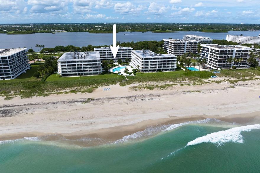 Impeccable, fully renovated 2 bedroom, 2 bath residence in the coveted, newly renovated oceanfront 2600 Building with no pending assessments. This beautifully appointed home offers stunning direct ocean views from a private patio with two spiral staircases leading to the spectacular pool area. The spacious split bedroom layout provides comfort and privacy. The sleek kitchen features custom white cabinetry, marble countertops and backsplash, integrated appliances, and a generous peninsula ideal for casual dining and entertaining. Enjoy top tier amenities including a renovated pool deck, state-of-the-art fitness center, Har-Tru tennis courts, and a wide, pristine beach--true Palm Beach oceanfront living.