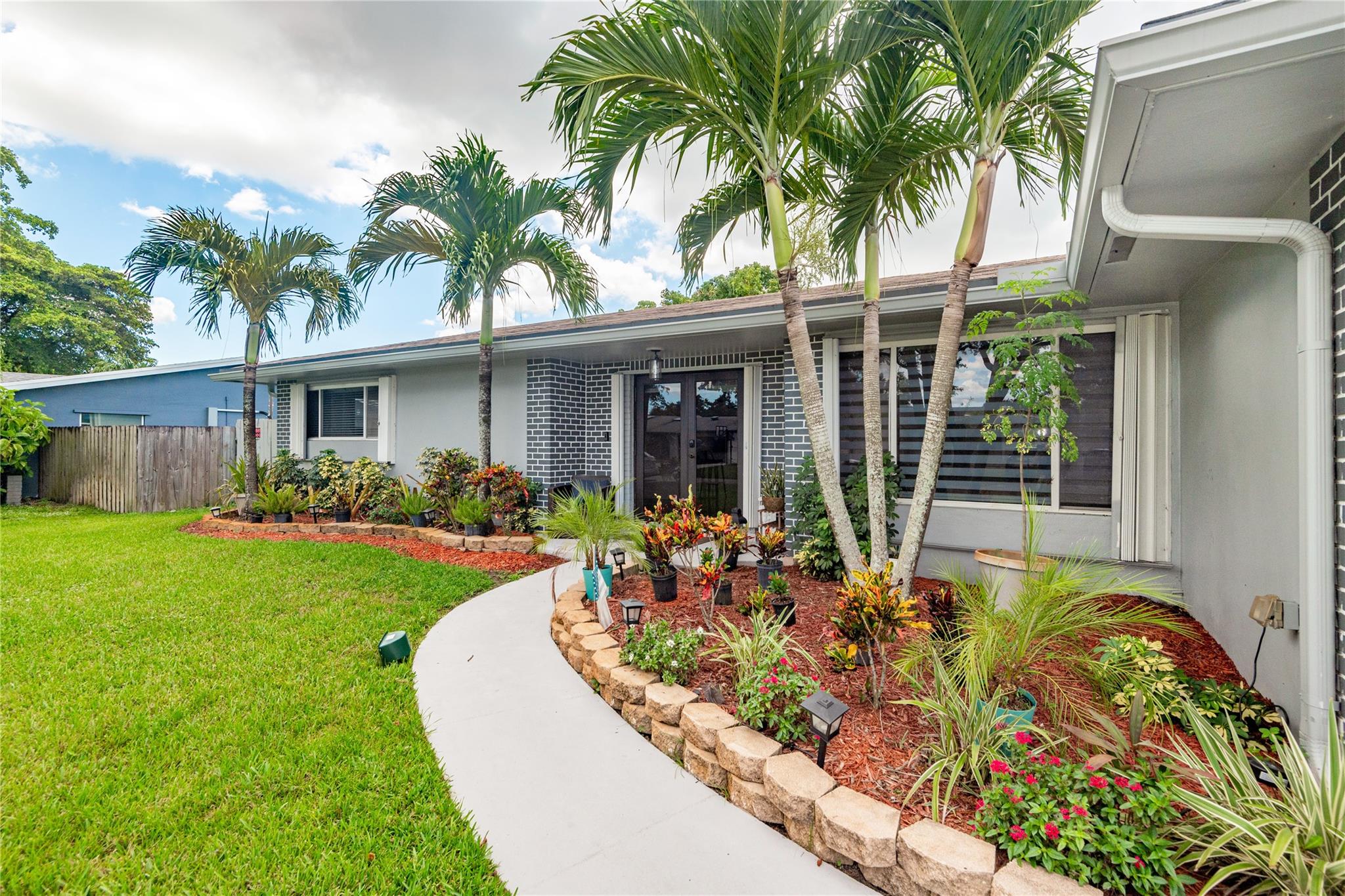 Welcome to 7410 NW 13th Court, this beautiful home is in the heart of Plantation. This well-kept home allows you to unwind like your own vacation oasis. This home has a open kitchen with granite countertops and stainless-steel appliances with lots of room to entertain friends and family. The private enclosed yard with extended patio, newly surfaced pool (2024), accordion shutters and BBQ will make you feel like every day is a vacation. Additionally, the home features a newly installed a/c 2024 and a high efficiency water heater in 2021. The house is located minutes away from Plantation Walk which features restaurants and entertainment. It is also close to beautiful Central Park and the turnpike. Schedule to show today.