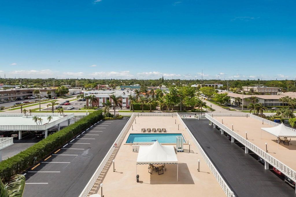 Photo of 401 Lake Shore Drive #406, Lake Park, FL 33403 (MLS # R11143732)