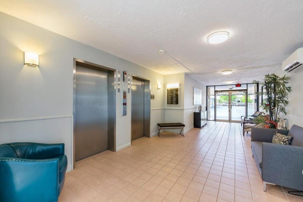 Photo of 401 Lake Shore Drive #406, Lake Park, FL 33403 (MLS # R11143732)