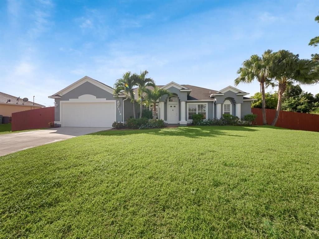 Photo of 3318 SW Ludlow Street St, Port St Lucie, FL 34953 (MLS # R10758582)
