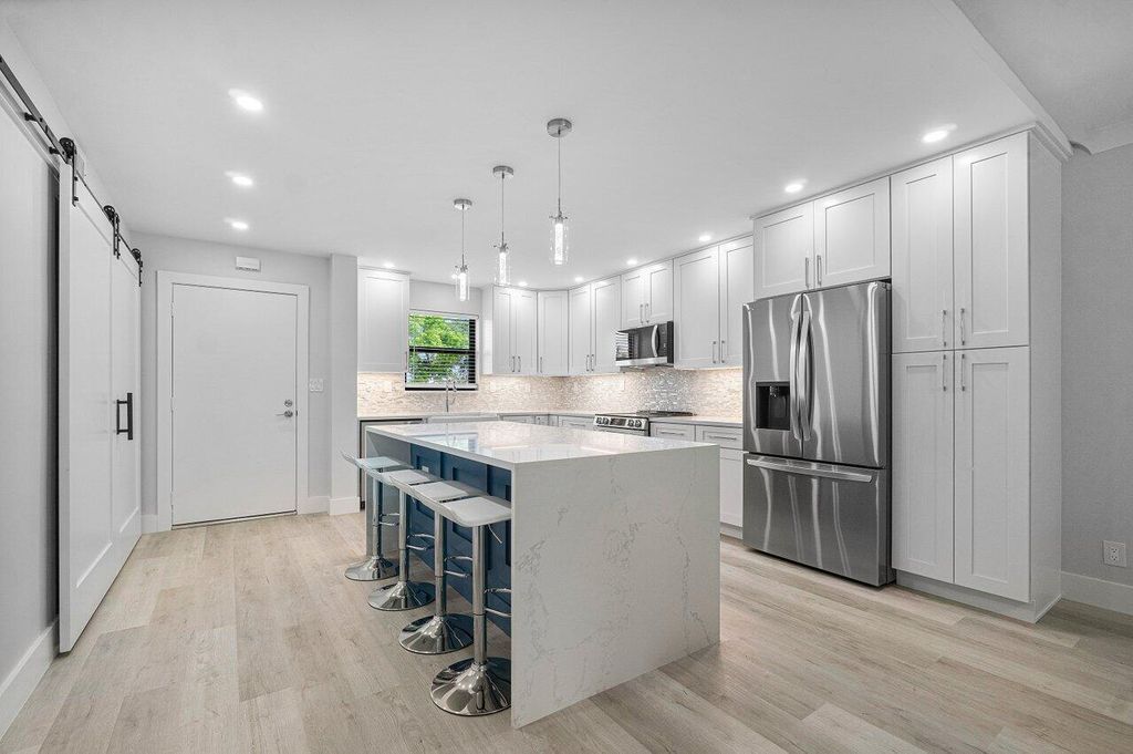 Photo of 300 N Highway A1a #F-205, Jupiter, FL 33477 (MLS # R10993416)