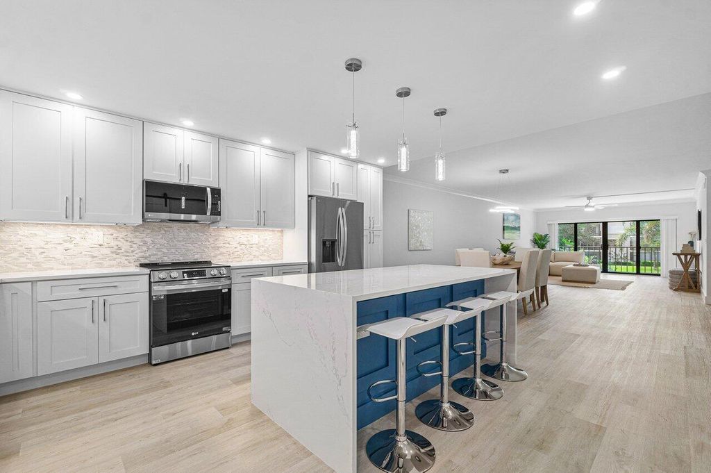 Photo of 300 N Highway A1a #F-205, Jupiter, FL 33477 (MLS # R10993416)