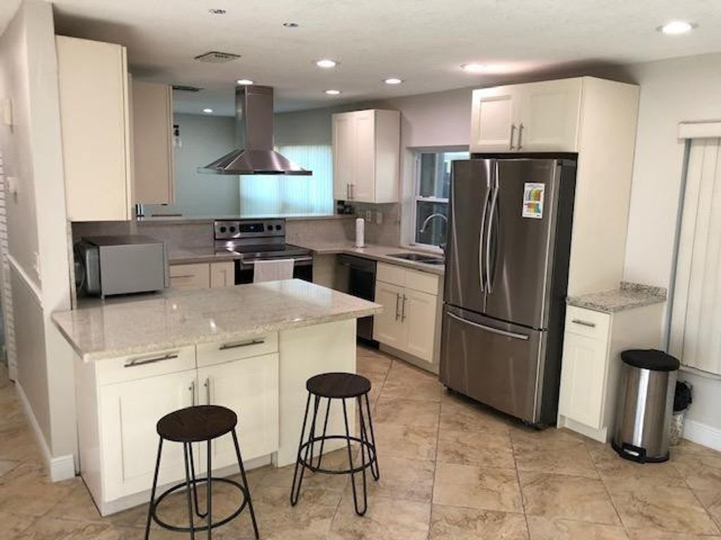 Photo of 60 Forest Circle, Hollywood, FL 33026 (MLS # F10544165)