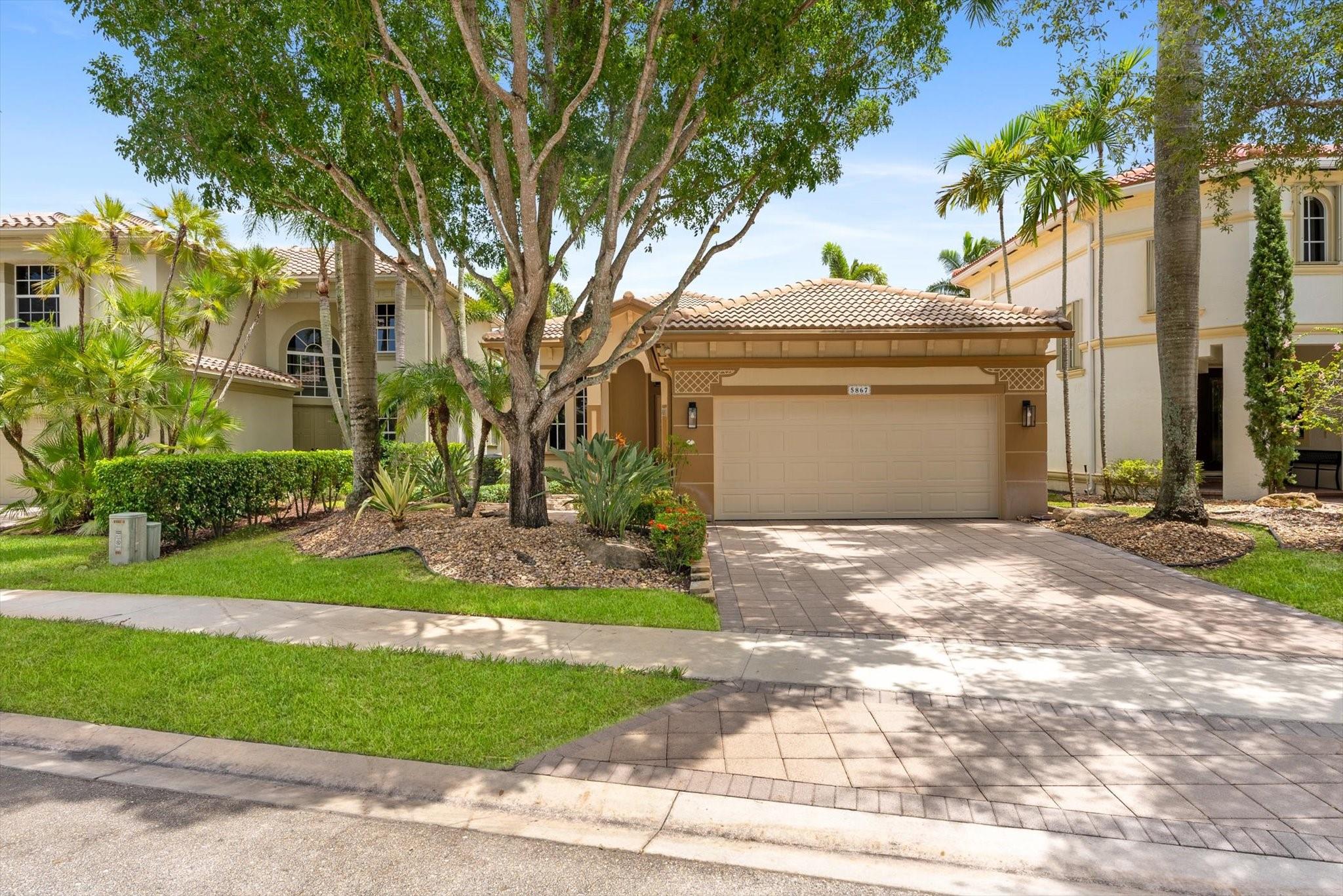Office/Den can easily become the 4th Bedroom. Experience the privacy of a single-family pool home with the ease of maintenance-free living, all within the Enclave at upscale Heron Bay. This exceptional home offers access to one of South Florida’s most extensive collections of resort-style amenities, programs, & community events—all designed to enhance your lifestyle. The double entry leads to a beautiful interior with soaring ceilings & expansive windows & spacious living areas flooded with natural light. The kitchen/family room features wood cabinetry, granite counters & SS appliances. One guest bedroom opens to a private courtyard—perfect for guests or in-laws. The backyard features a pool with waterfall & large patio. Lawn care & exterior painting provided through HOA.