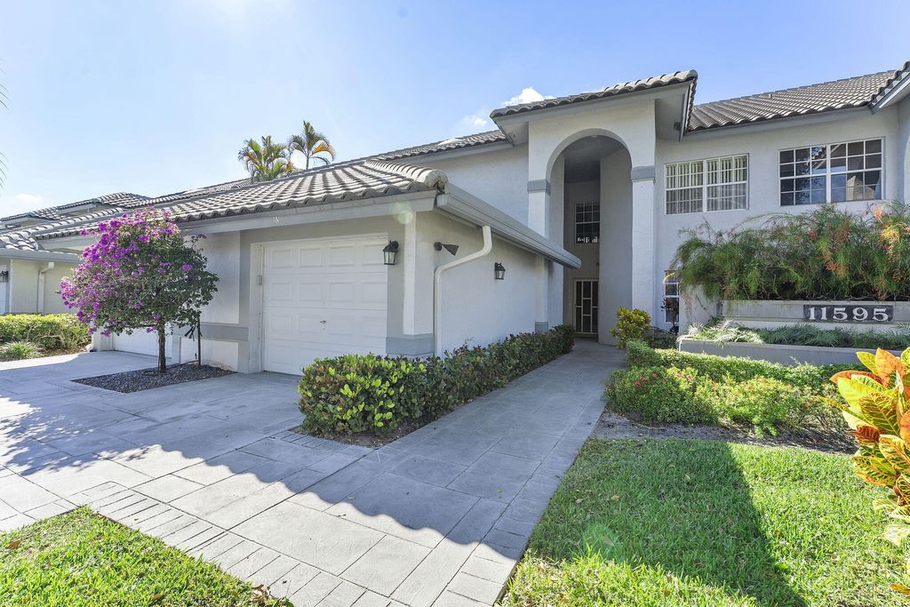 Photo of 11595 Briarwood Circle #1, Boynton Beach, FL 33437 (MLS # R11143049)