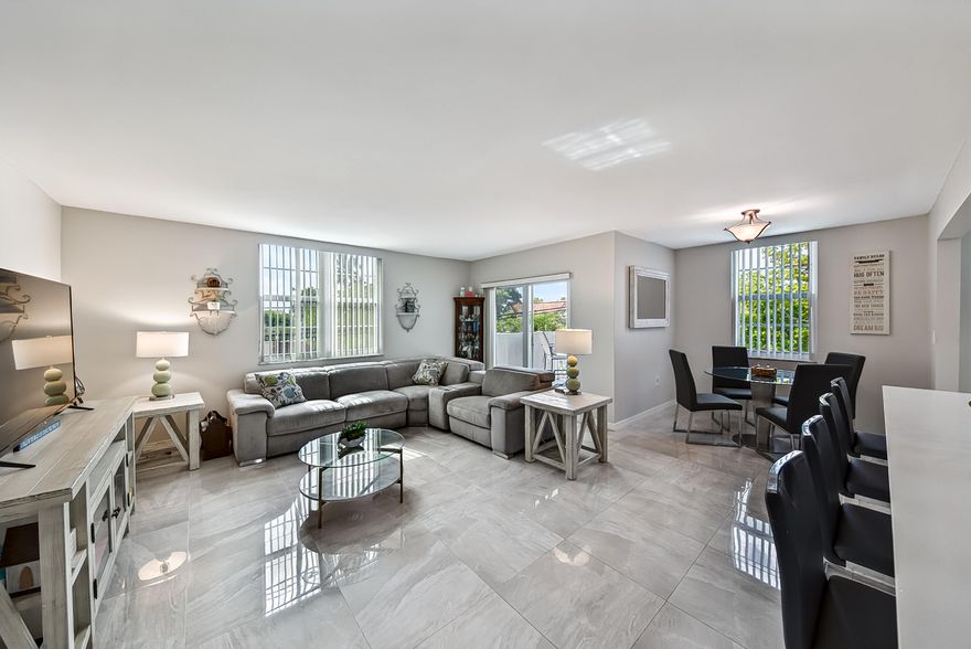 Discover this hidden gem in Fort Lauderdale's Imperial Point! This beautifully remodeled 2 bedroom, 2 bath southeast corner unit offers a perfectly laid-back South Florida lifestyle. Step inside to an open-concept layout filled with natural light, featuring a modern kitchen with stainless steel appliances, polished tile floors throughout, in-unit washer/dryer and hurricane impact windows and doors. Unwind on your private balcony, where a lush tree canopy and peaceful pool views bring a sense of pure relaxation to your everyday routine. Nestled in a well-maintained building with all major milestones already completed, you're just minutes from favorite local dining, shopping, and the beach. Come see what makes this beautiful retreat so special!