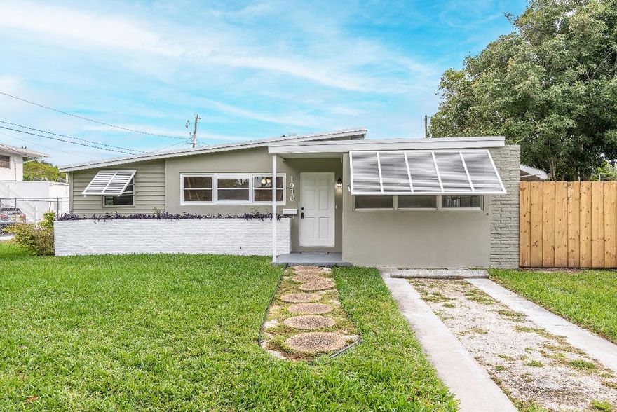 Discover your ideal East Hollywood haven! This three-bedroom, two-bathroom gem offers a worry-free lifestyle with a new roof and AC. The master suite, featuring a private entrance, ensures a retreat-like experience. Revel in new flooring throughout, complementing the updated kitchen and bathrooms. A spacious, fully fenced backyard invites outdoor enjoyment. Located steps from downtown Hollywood, relish the convenience of local hotspots. Seize this opportunity to own a blend of comfort and style in a prime Florida location. Welcome home!