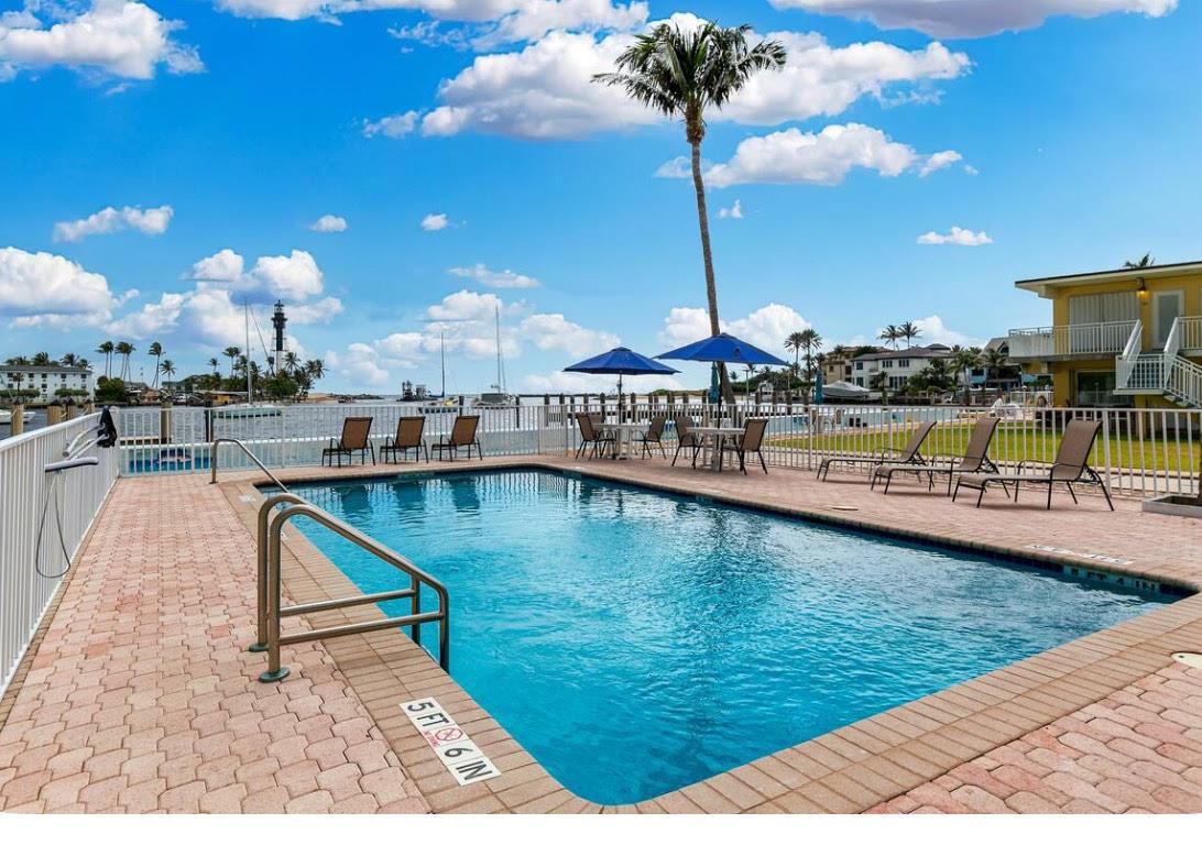 Welcome to your slice of paradise in the heart of Pompano Beach! This beautifully maintained waterfront condo offers the perfect blend of comfort, convenience, and coastal charm. Located in the highly desirable Hillsboro Inlet community, this unit boasts stunning views and direct access to the sparkling waters of the Bay.