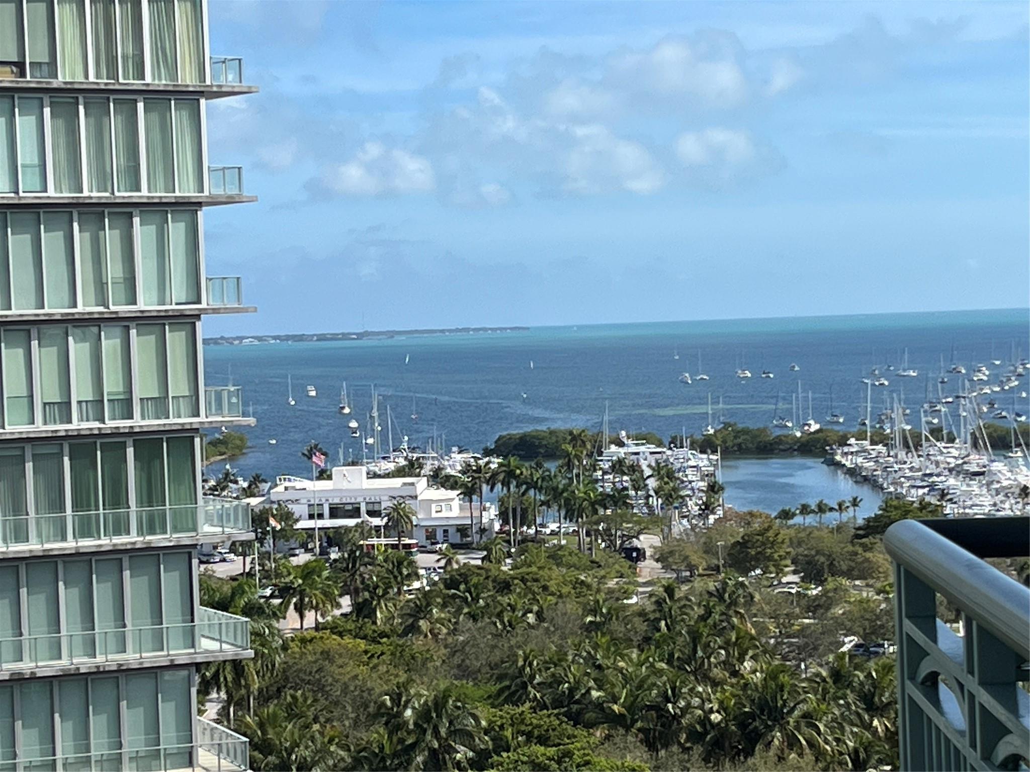 Fabulous 12th floor 1 bedroom 1.5 bath unit at the Ritz-Carlton Residences in Coconut Grove. Great city and bay views from both terraces, living room and bedroom. Tiled floor throughout, open kitchen with granite countertops and stainless appliances. The spacious bedroom has a walk-in closet with built-ins. Primary bathroom has separate tub & shower and double sinks. Foyer entry has extra closets, half bath and washer & dryer. Enjoy luxury living with all the services and amenities that the Ritz offers.