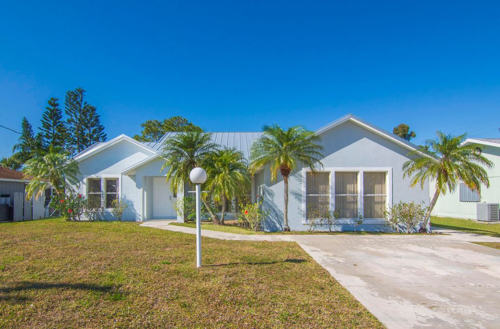 Photo of 6504 Coquina Avenue, Fort Pierce, FL 34951 (MLS # R11075025)