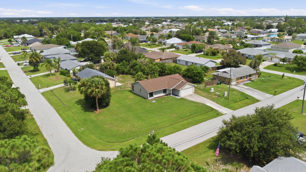 Photo of 4057 SW Haycroft Street, Port Saint Lucie, FL 34953 (MLS # B26068298)