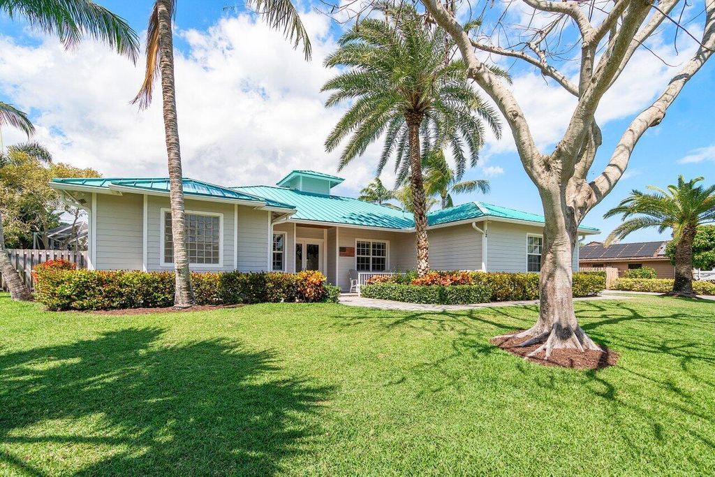 Photo of 12 SE Paddock Circle, Tequesta, FL 33469 (MLS # R10971318)