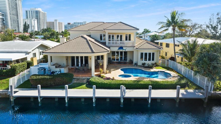 This is the home you’ve been waiting for! Newly built in 2012, this 2-story home has it all! 80’ of waterfront w/ 70’ dock for your yacht! 900’ to the ICW w/ no fixed bridges…a boaters dream! This 6 bed/ 3 bath + two ½ baths home has upgrades galore & has been immaculately maintained! Primary suite & 2nd BR on 1st floor. Spacious floor plan w/ Brazilian cherry wood flooring & tile thru/out! Formal LR & DR w/ working stone fireplace & wet bar! Eat-in kitchen w/ bar area, wood cab. & granite! 4 oversized BRs upstairs w/ walk-in closets! Van Kirk heated free form freshwater pool & spa! Summer kitchen & covered area great for entertaining! 2023 3-zone Rheem A/Cs! Brand new Generac full home generator! 10’ ceilings. Elevator shaft in place! 500 gal. underground propane tank! A true must see!