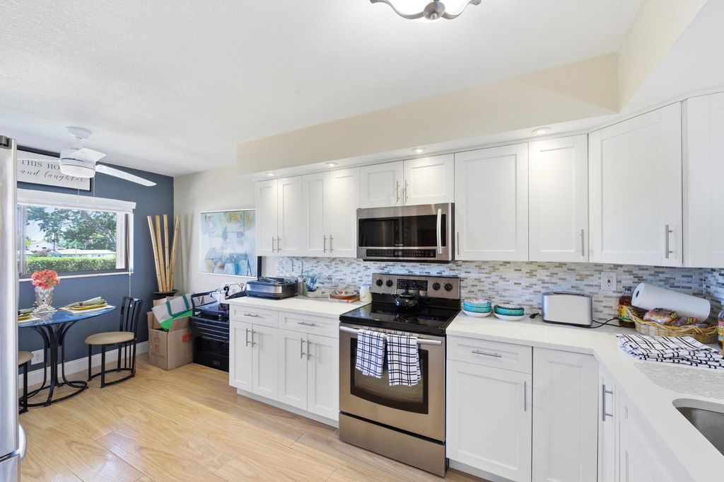 Photo of 15461 Pembridge Drive #207, Delray Beach, FL 33484 (MLS # B26026366)
