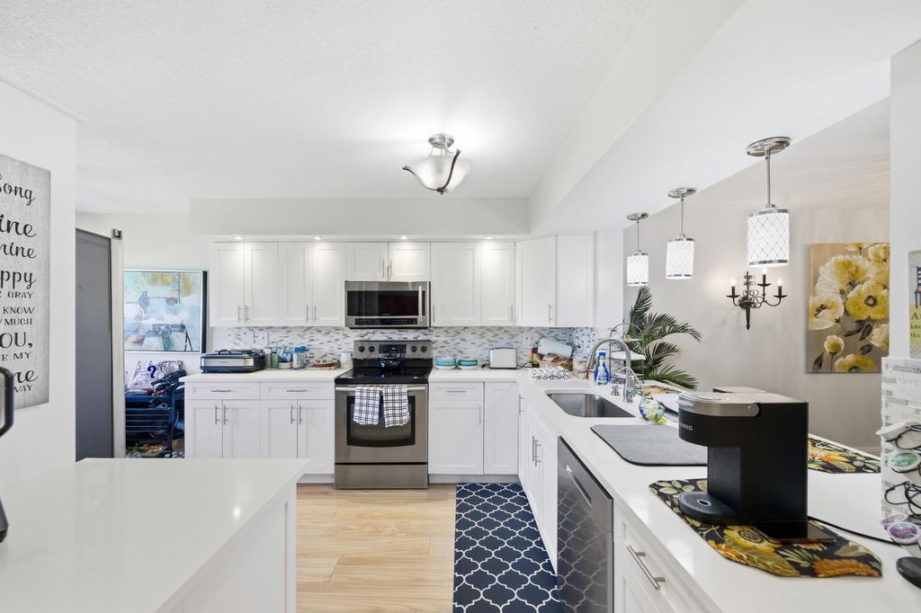 Photo of 15461 Pembridge Drive #207, Delray Beach, FL 33484 (MLS # B26026366)