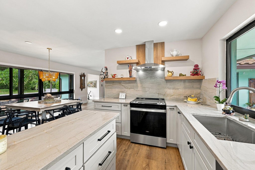 Photo of 5850 NE 21ST Avenue, Fort Lauderdale, FL 33308 (MLS # B26081675)