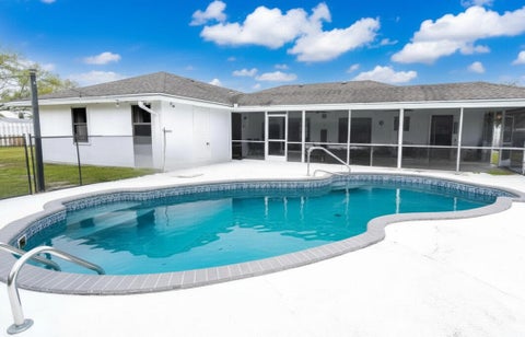 Photo of 106 Segovia Court, Royal Palm Beach, FL 33411 (MLS # B26033994)