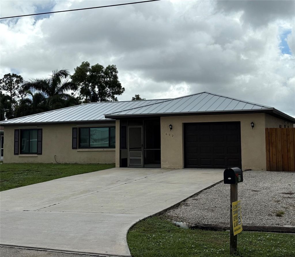 Photo of 632 SE Essex Drive, Port Saint Lucie, FL 34984 (MLS # F10524050)