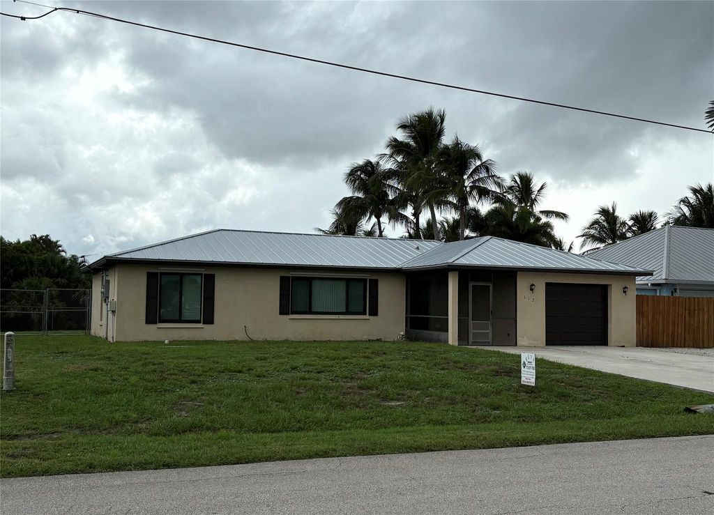 Photo of 632 SE Essex Drive, Port Saint Lucie, FL 34984 (MLS # F10524050)