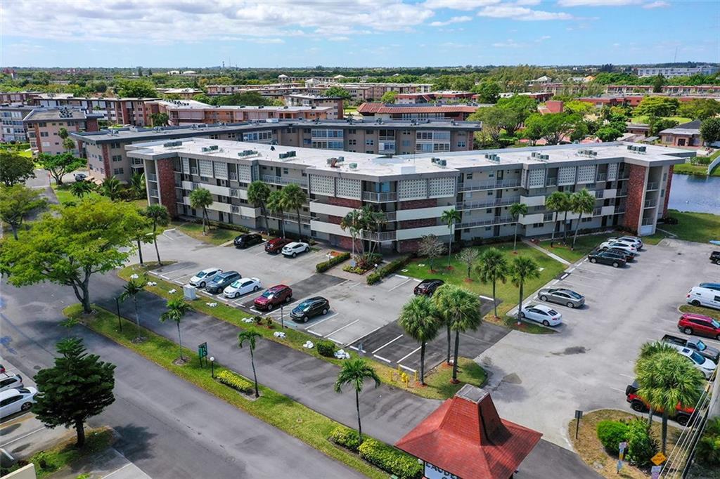 Wonderful 1/1.5 ground floor unit in the heart of Lauderdale Lakes! Lauderdale Oaks is a well maintained, active, vibrant 55+ community and this unit is a great opportunity to experience all the amenities & conveniences on offer. This unit boasts updated kitchen & baths, neutral tile floor continuous throughout the whole unit & patio. Big master bedroom w/en suite bath & ample closet space. Enclosed patio w/built in murphy bed for outdoor living & guest sleeping area. Spacious, light & bright characterize this condo that is well located in the complex with a short walk to the main pool & clubhouse. Amenities included heated pools, spa, bocce, shuffleboard, extensive clubhouse w/fitness center, saunas, billiards, card rooms, meeting rooms, regularly scheduled shows & planned activities.