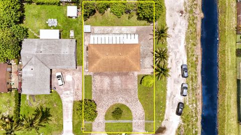 Tiny photo for 2488 Pineway Drive, West Palm Beach, FL 33415 (MLS # B26054093)
