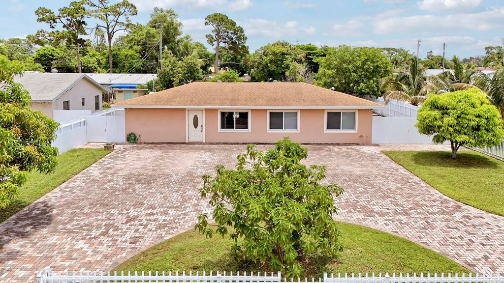Photo of 2488 Pineway Drive, West Palm Beach, FL 33415 (MLS # B26054093)