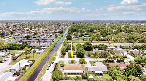 Tiny photo for 2488 Pineway Drive, West Palm Beach, FL 33415 (MLS # B26054093)