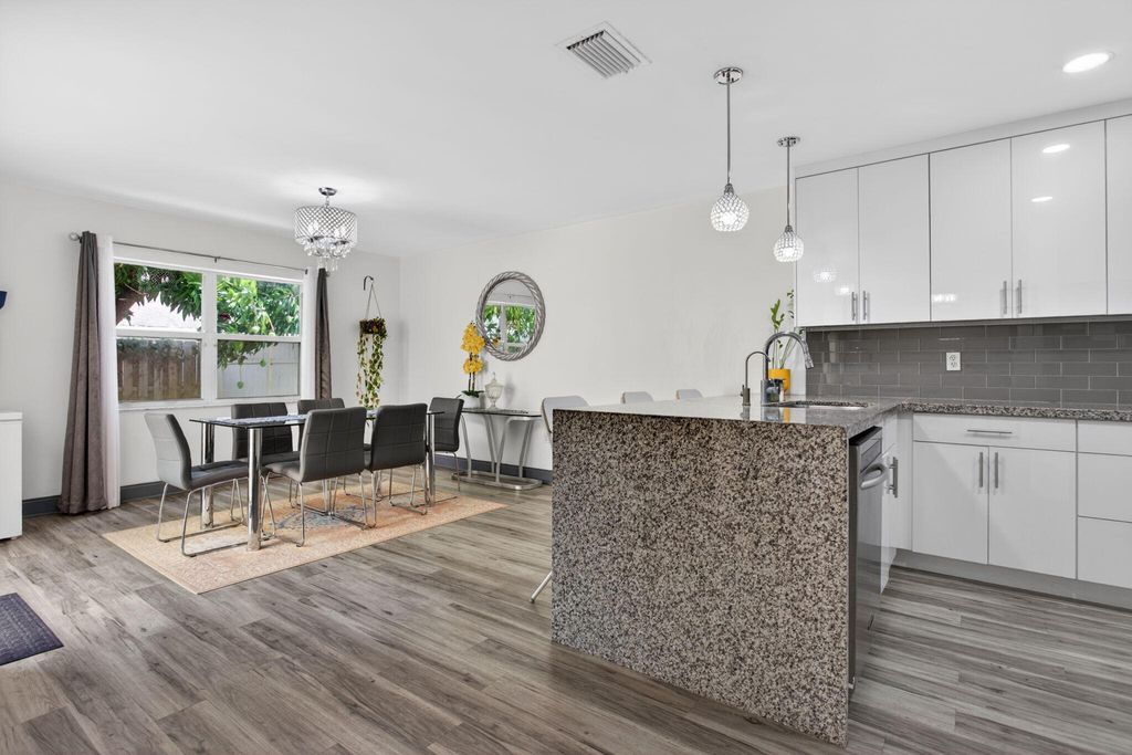 Photo of 4131 Eastridge Circle, Pompano Beach, FL 33064 (MLS # B26028351)