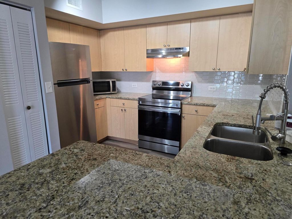 Photo of 701 Villa Circle, Boynton Beach, FL 33435 (MLS # R11079240)