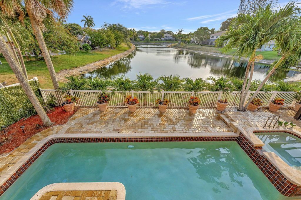 Photo of 6341 NW 57th Way, Parkland, FL 33067 (MLS # R10985314)