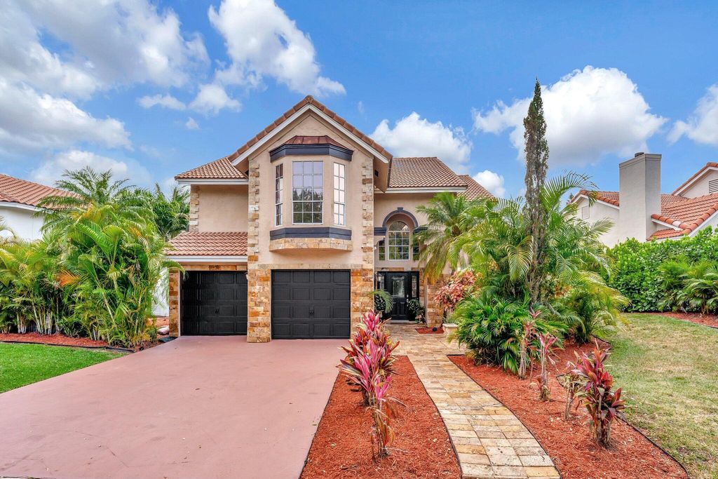 Photo of 6341 NW 57th Way, Parkland, FL 33067 (MLS # R10985314)
