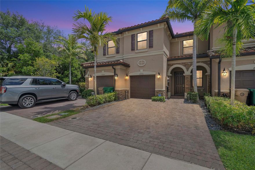 Built in 2019, this move-in-ready townhome has been lovingly cared for and shows like new! Featuring 3bed, 2.5bath, and laundry upstairs, this home also includes a 1-car garage and impact windows throughout. The spacious layout offers a living room, dining area, and family room for easy entertaining. The kitchen shines with quartz counters, stainless steel appliances, white shaker cabinets, and recessed lighting. Enjoy tile floors on the first level and upgraded ceiling fans throughout. The primary suite boasts a walk-in closet, dual sinks, and a walk-in shower. Outside, relax in your private, fenced-in patio with pavers. Extras include a tankless water heater and electric car charger. Centrally located near the Turnpike, top colleges, Hard Rock Casino, restaurants, and shopping.