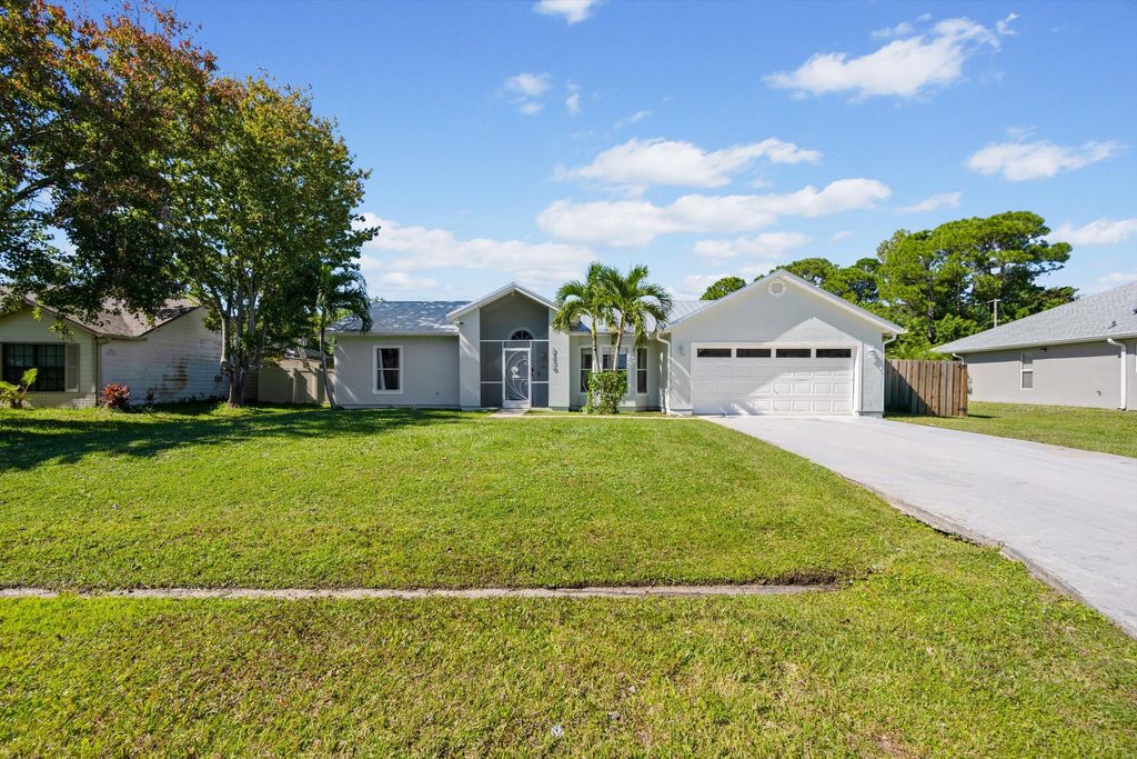 Photo of 2230 SE Dill Lane, Port Saint Lucie, FL 34952 (MLS # B26044307)