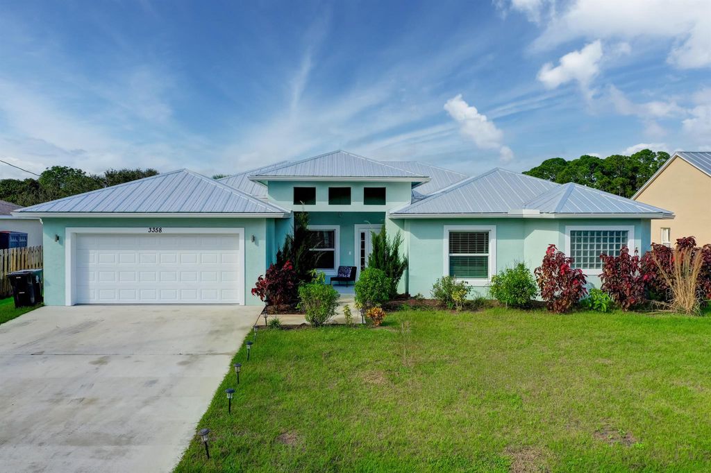 Photo of 3358 SW Martin Street, Port St Lucie, FL 34953 (MLS # R10943518)
