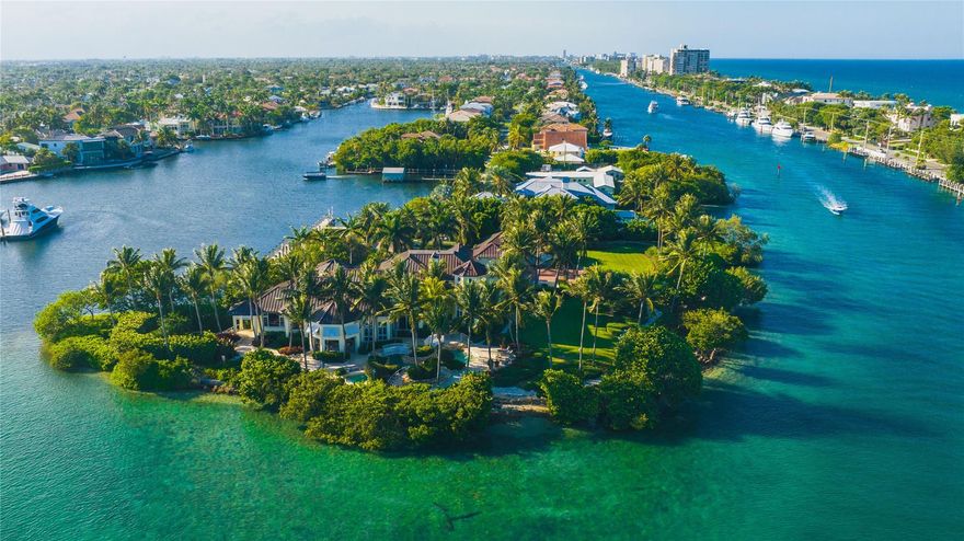 Florida Landmark Estate on Caps Island! It has never been offered and will never be duplicated. Sitting on the 1.7 acre peninsula of the island, the 889 feet of shoreline of this remarkable estate is seconds to the inlet & surrounded by the Intracoastal Waterway & Lake Placid. Almost 8,000 sf under air, with 5 bds, office, and 5.5 ba. The total area of the buildings is 11,630 sf. Two car garage attached to the main home & an additional building that has another 2 car garage plus a golf cart garage and huge storage area (all air conditioned). Resort style pool with sit down bar & spa plus a separate private spa off master. The existing concrete pier is 110 feet long with 3 power pedestals, fresh water, and a waste pump out. There will only be one privileged Buyer to seize this opportunity!