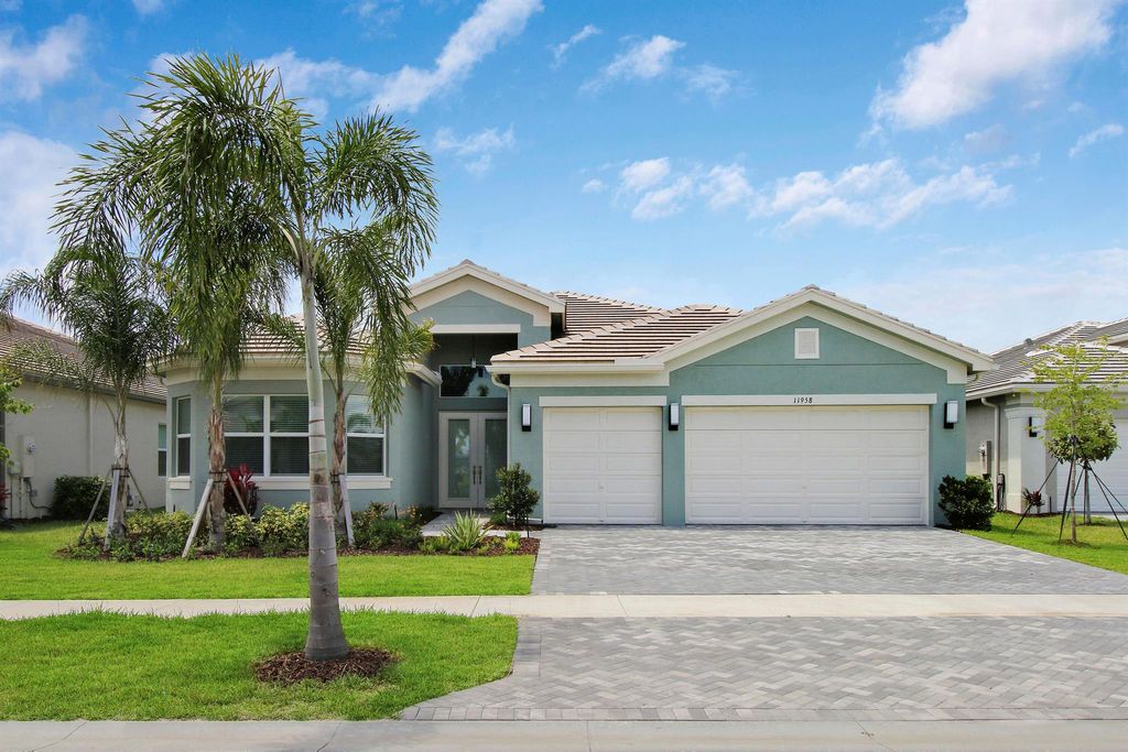 Photo of 11958 SW Laguna Bay Parkway, Port St Lucie, FL 34987 (MLS # R10884237)