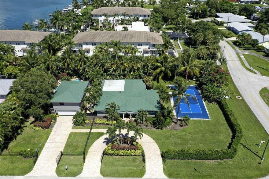 Resort-Style Beach Estate – Exceptional Income, Unmatched Luxury Experience coastal luxury at the Island Oasis &amp; Coastal Cottage, just three blocks from the shimmering beaches of Hutchinson Island. This exceptional property offers two distinct residences—a bright, expansive main home and a private, fully-appointed guest cottage—perfect for hosting, multi-generational living, or maximizing versatile rental income. The estate features a sparkling saltwater pool, relaxing jacuzzi, private pickleball court, stylish cabana bath, outdoor kitchen, twin fire pits, and tranquil hammocks, all designed for effortless entertaining and private retreat. A top-rated, profitable Airbnb with consistent 5-star reviews and year-round bookings, this property blends relaxation and investment in one turn-key package. Enjoy peace of mind with full storm protection, smart home systems, and top-tier appliances. Whether you desire a show- stopping private haven or proven income generator, this residence exceeds expectations for the most discerning buyer. Verified financials and rental history available for serious inquiries.